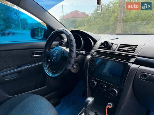 Синий Мазда 3, объемом двигателя 1.6 л и пробегом 237 тыс. км за 5300 $, фото 5 на Automoto.ua