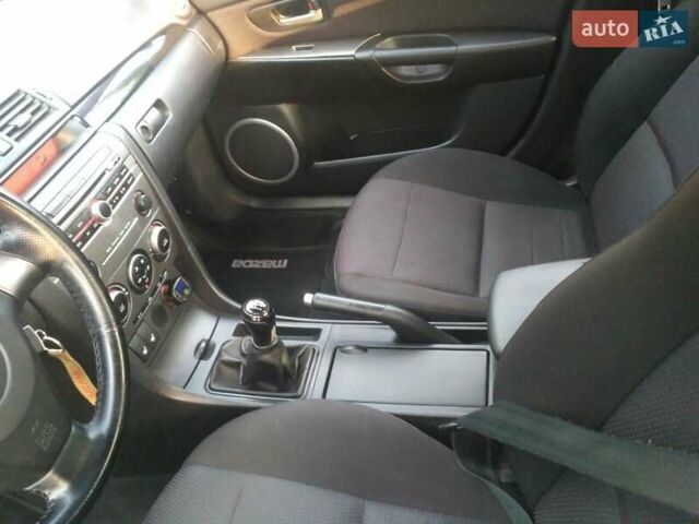 Синий Мазда 3, объемом двигателя 1.6 л и пробегом 182 тыс. км за 5200 $, фото 9 на Automoto.ua