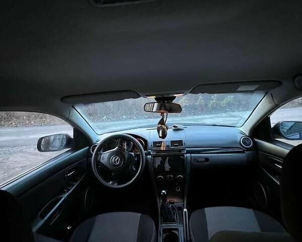 Синий Мазда 3, объемом двигателя 2 л и пробегом 286 тыс. км за 4200 $, фото 7 на Automoto.ua