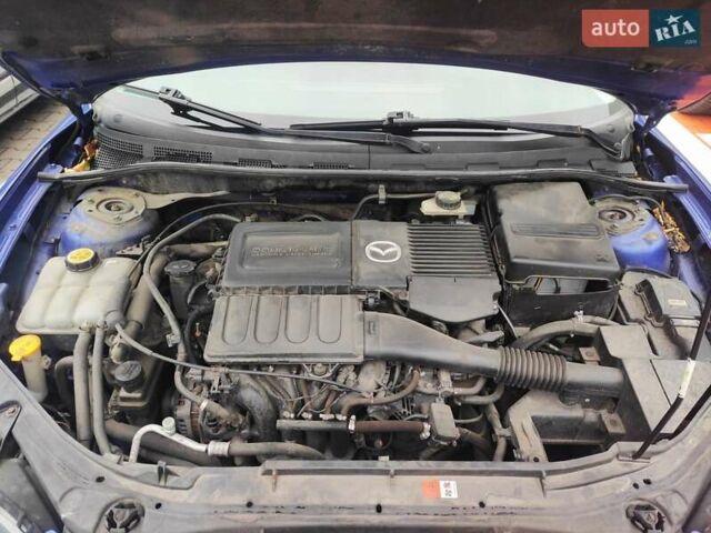 Синий Мазда 3, объемом двигателя 1.6 л и пробегом 234 тыс. км за 5300 $, фото 18 на Automoto.ua