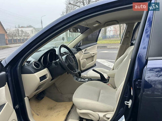 Синий Мазда 3, объемом двигателя 2 л и пробегом 192 тыс. км за 5999 $, фото 28 на Automoto.ua