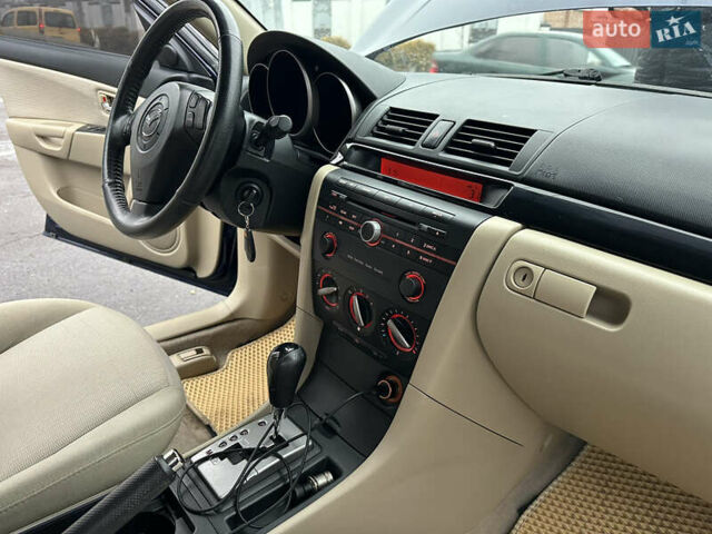 Синий Мазда 3, объемом двигателя 2 л и пробегом 192 тыс. км за 5999 $, фото 39 на Automoto.ua