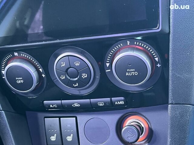 Синий Мазда 3, объемом двигателя 1.6 л и пробегом 170 тыс. км за 6490 $, фото 19 на Automoto.ua
