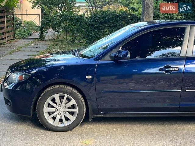 Синий Мазда 3, объемом двигателя 1.6 л и пробегом 170 тыс. км за 6490 $, фото 4 на Automoto.ua