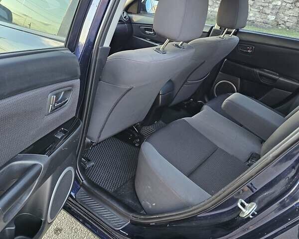 Синий Мазда 3, объемом двигателя 1.6 л и пробегом 217 тыс. км за 5400 $, фото 18 на Automoto.ua