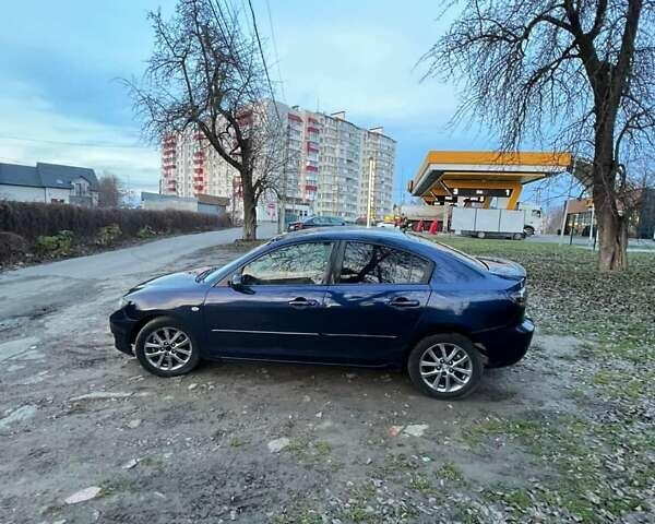 Синий Мазда 3, объемом двигателя 2 л и пробегом 286 тыс. км за 4200 $, фото 5 на Automoto.ua