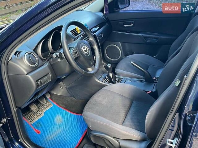 Синий Мазда 3, объемом двигателя 1.6 л и пробегом 170 тыс. км за 6490 $, фото 24 на Automoto.ua