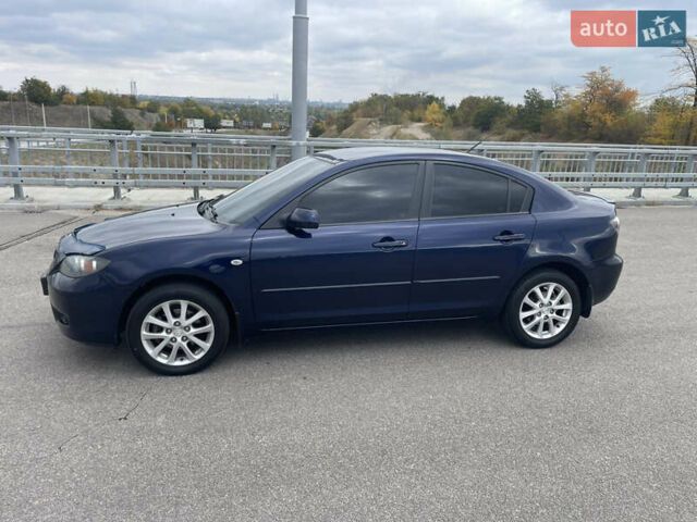 Синий Мазда 3, объемом двигателя 1.6 л и пробегом 187 тыс. км за 6100 $, фото 2 на Automoto.ua