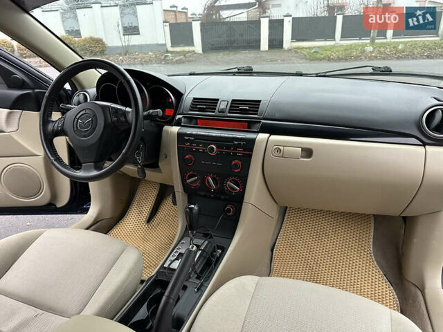 Синий Мазда 3, объемом двигателя 2 л и пробегом 192 тыс. км за 5999 $, фото 36 на Automoto.ua
