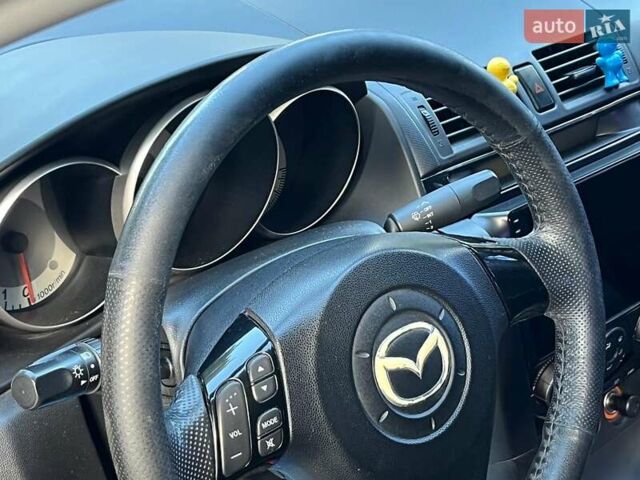 Синий Мазда 3, объемом двигателя 1.6 л и пробегом 170 тыс. км за 6490 $, фото 28 на Automoto.ua