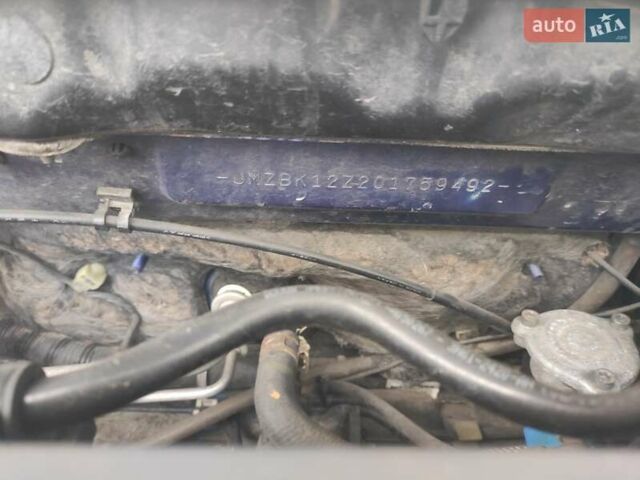 Синий Мазда 3, объемом двигателя 1.6 л и пробегом 234 тыс. км за 5300 $, фото 19 на Automoto.ua