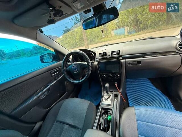 Синий Мазда 3, объемом двигателя 1.6 л и пробегом 237 тыс. км за 5300 $, фото 12 на Automoto.ua