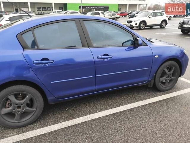 Синий Мазда 3, объемом двигателя 1.6 л и пробегом 234 тыс. км за 5300 $, фото 2 на Automoto.ua