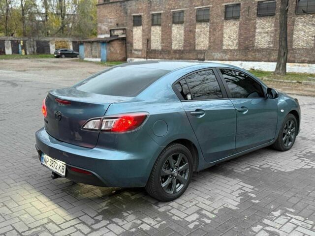 Синий Мазда 3, объемом двигателя 1.6 л и пробегом 228 тыс. км за 5950 $, фото 1 на Automoto.ua
