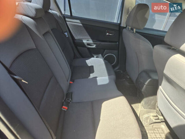 Синий Мазда 3, объемом двигателя 2 л и пробегом 136 тыс. км за 7700 $, фото 12 на Automoto.ua