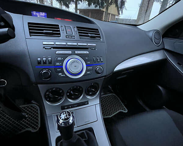 Синий Мазда 3, объемом двигателя 1.6 л и пробегом 171 тыс. км за 7550 $, фото 14 на Automoto.ua