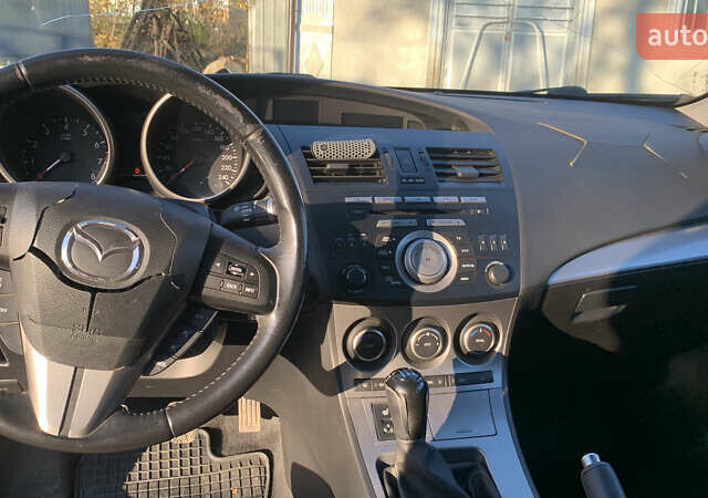 Синий Мазда 3, объемом двигателя 1.6 л и пробегом 189 тыс. км за 5500 $, фото 4 на Automoto.ua