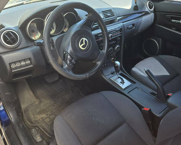 Синий Мазда 3, объемом двигателя 2 л и пробегом 136 тыс. км за 7700 $, фото 9 на Automoto.ua