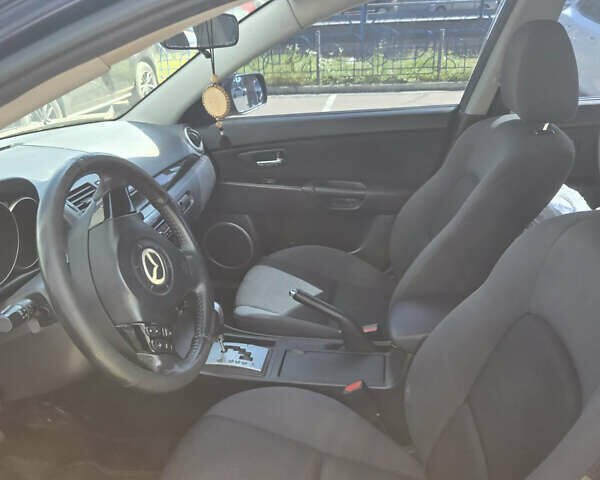 Синий Мазда 3, объемом двигателя 2 л и пробегом 136 тыс. км за 7700 $, фото 7 на Automoto.ua