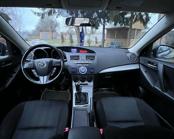Синий Мазда 3, объемом двигателя 1.6 л и пробегом 171 тыс. км за 7550 $, фото 16 на Automoto.ua