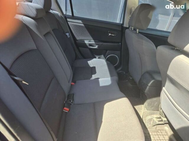 Синий Мазда 3, объемом двигателя 2 л и пробегом 136 тыс. км за 7700 $, фото 12 на Automoto.ua