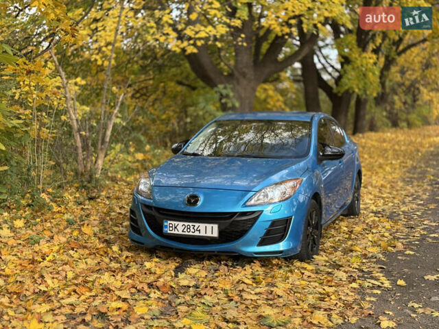 Синий Мазда 3, объемом двигателя 1.6 л и пробегом 206 тыс. км за 7500 $, фото 1 на Automoto.ua