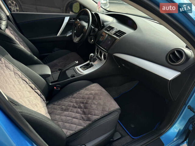 Синий Мазда 3, объемом двигателя 1.6 л и пробегом 206 тыс. км за 7500 $, фото 25 на Automoto.ua