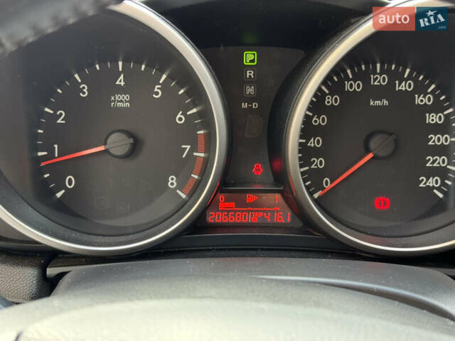 Синий Мазда 3, объемом двигателя 1.6 л и пробегом 206 тыс. км за 7500 $, фото 18 на Automoto.ua