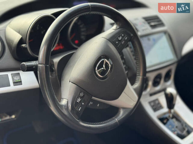 Синий Мазда 3, объемом двигателя 1.6 л и пробегом 206 тыс. км за 7500 $, фото 12 на Automoto.ua