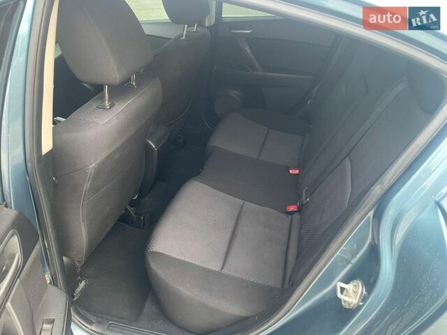 Синий Мазда 3, объемом двигателя 2 л и пробегом 190 тыс. км за 5800 $, фото 11 на Automoto.ua