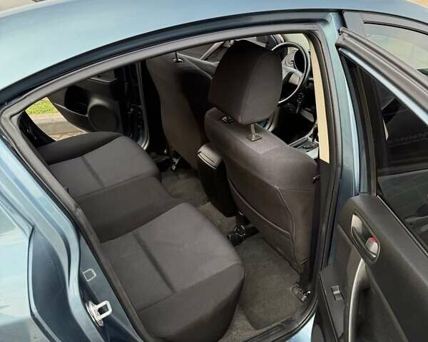 Синій Мазда 3, об'ємом двигуна 2 л та пробігом 185 тис. км за 6600 $, фото 4 на Automoto.ua