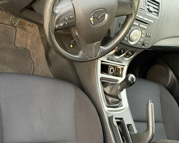 Синий Мазда 3, объемом двигателя 2 л и пробегом 111 тыс. км за 5600 $, фото 11 на Automoto.ua