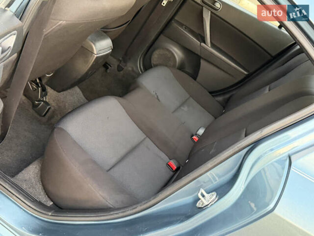 Синий Мазда 3, объемом двигателя 2 л и пробегом 111 тыс. км за 5600 $, фото 13 на Automoto.ua