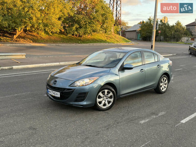 Синий Мазда 3, объемом двигателя 2 л и пробегом 111 тыс. км за 5600 $, фото 1 на Automoto.ua