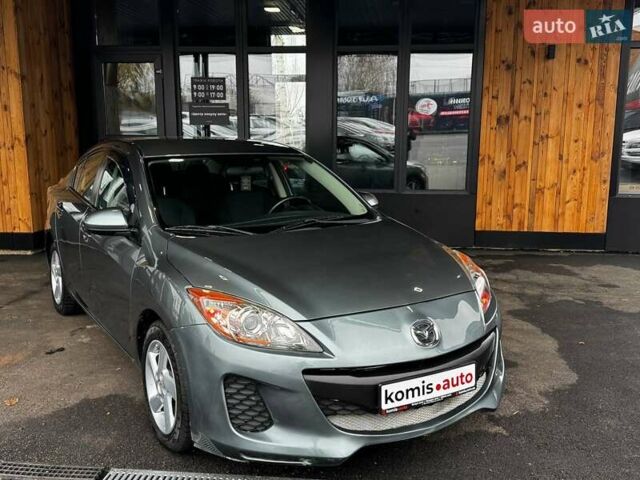 Синий Мазда 3, объемом двигателя 2 л и пробегом 220 тыс. км за 7599 $, фото 3 на Automoto.ua