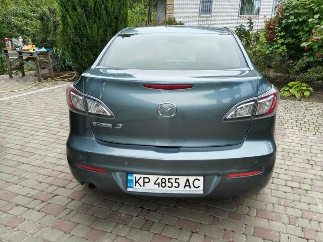 Синий Мазда 3, объемом двигателя 2 л и пробегом 202 тыс. км за 7700 $, фото 3 на Automoto.ua