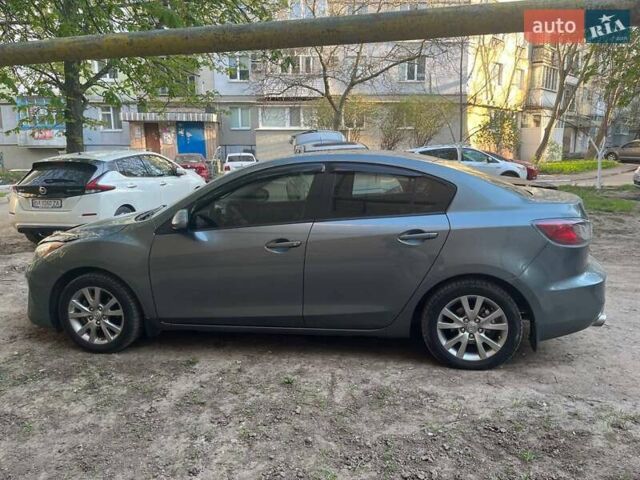 Синий Мазда 3, объемом двигателя 2 л и пробегом 160 тыс. км за 7300 $, фото 3 на Automoto.ua