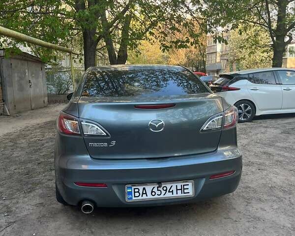 Синий Мазда 3, объемом двигателя 2 л и пробегом 160 тыс. км за 7300 $, фото 2 на Automoto.ua