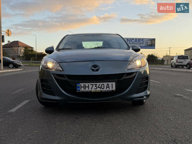 Синий Мазда 3, объемом двигателя 2 л и пробегом 111 тыс. км за 5600 $, фото 7 на Automoto.ua