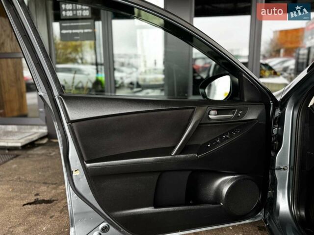 Синий Мазда 3, объемом двигателя 2 л и пробегом 220 тыс. км за 7599 $, фото 16 на Automoto.ua