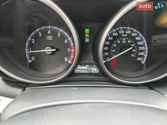 Синий Мазда 3, объемом двигателя 2 л и пробегом 202 тыс. км за 7700 $, фото 17 на Automoto.ua