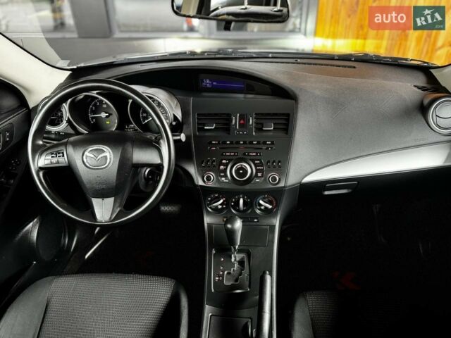Синій Мазда 3, об'ємом двигуна 2 л та пробігом 220 тис. км за 7599 $, фото 1 на Automoto.ua