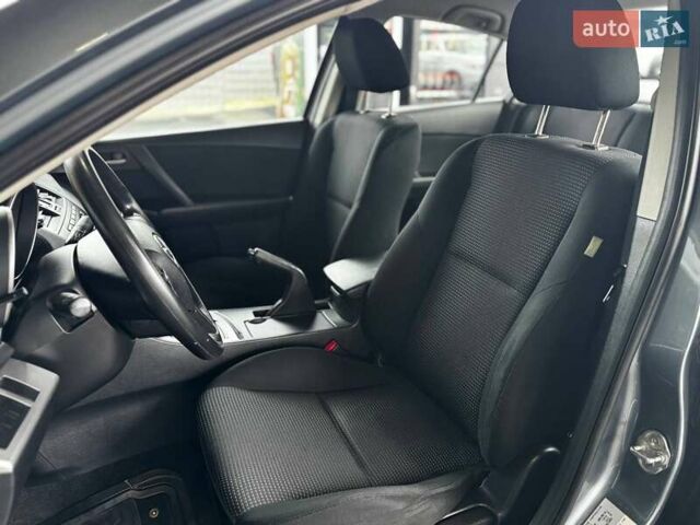 Синий Мазда 3, объемом двигателя 2 л и пробегом 220 тыс. км за 7599 $, фото 18 на Automoto.ua