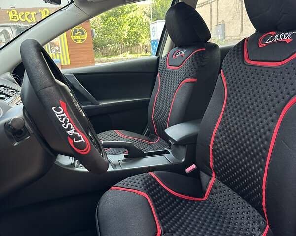 Синий Мазда 3, объемом двигателя 2 л и пробегом 155 тыс. км за 8000 $, фото 6 на Automoto.ua