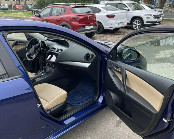 Синий Мазда 3, объемом двигателя 2 л и пробегом 212 тыс. км за 7500 $, фото 9 на Automoto.ua