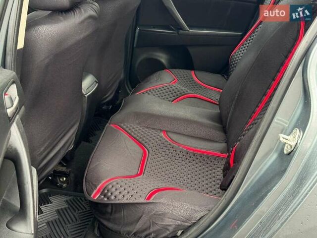 Синий Мазда 3, объемом двигателя 2 л и пробегом 245 тыс. км за 8740 $, фото 17 на Automoto.ua