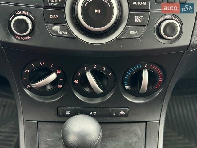 Синий Мазда 3, объемом двигателя 2 л и пробегом 245 тыс. км за 8740 $, фото 27 на Automoto.ua