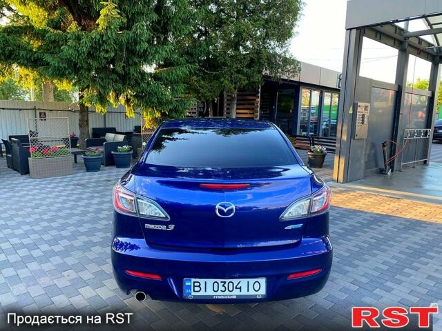 Синий Мазда 3, объемом двигателя 2 л и пробегом 197 тыс. км за 6600 $, фото 3 на Automoto.ua