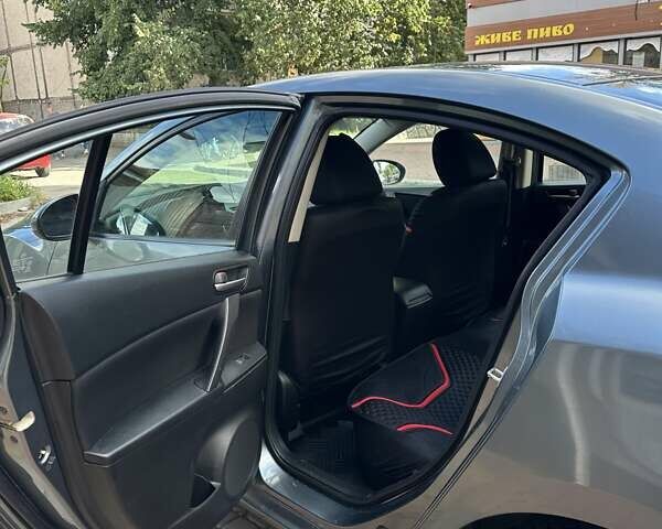 Синий Мазда 3, объемом двигателя 2 л и пробегом 155 тыс. км за 8000 $, фото 11 на Automoto.ua