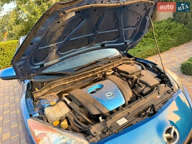 Синій Мазда 3, об'ємом двигуна 2 л та пробігом 137 тис. км за 7555 $, фото 28 на Automoto.ua